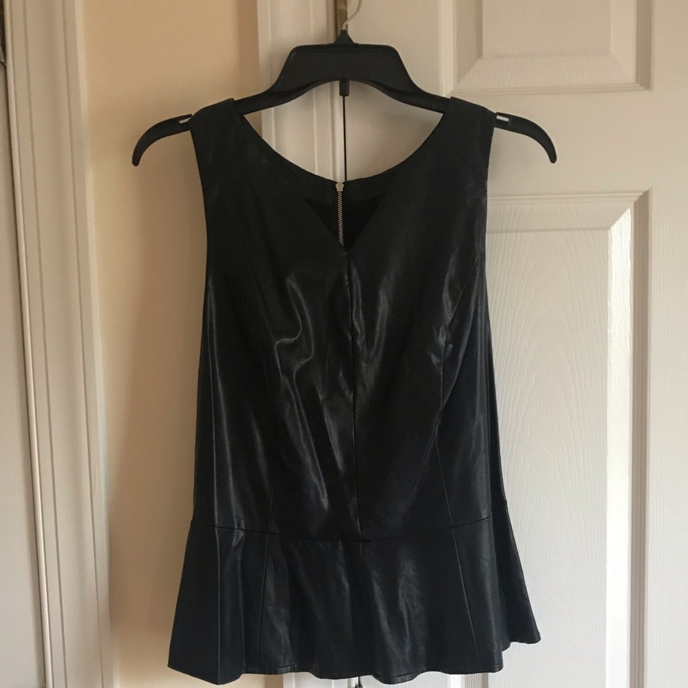 Used in excellent condition leather peplum top S